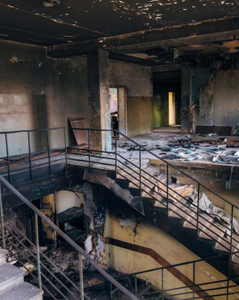Interior of a warehouse and staircase damaged badly by a fire
